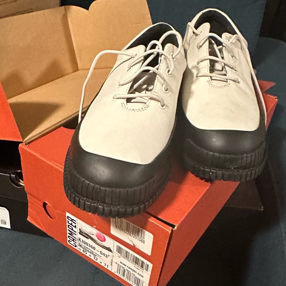 New in box. Cream and black Camper shoes, men’s size 12US.